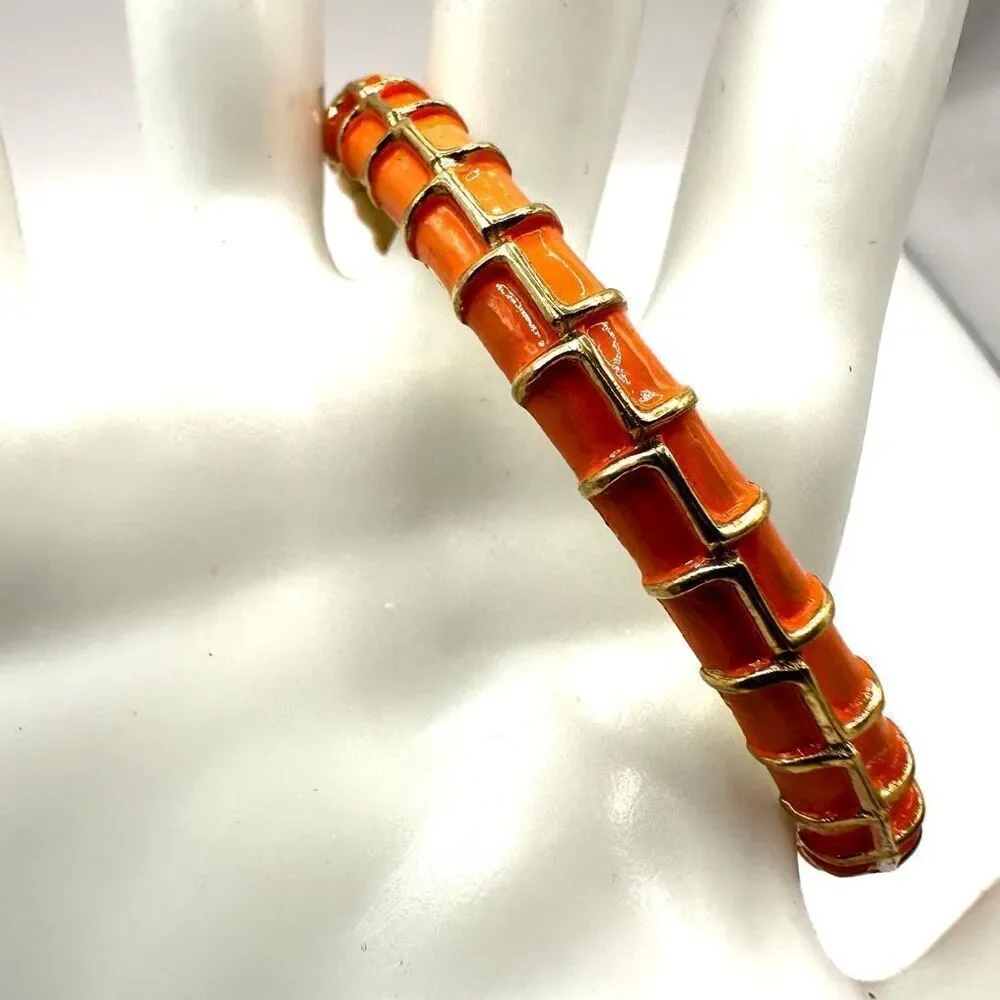 Crown Trifari orange and gold gone enamel bangle bracelet